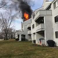 <p>Flames damaged a unit at the Rowayton Woods Condominiums on Wednesday afternoon in Norwalk.</p>