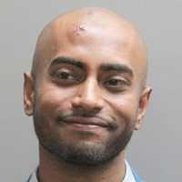 Long Island Burglary Suspect Nabbed After Yelling 'Let Me In' To Screaming Woman, Police Say
