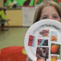 <p>Children at HealthBarn USA made collages of their favorite fruits and vegetables.</p>