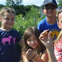 <p>HealthBarn USA founder Stacey Antine, right, picks organic blackberries that she grew at Abma&#x27;s Farm in Wyckoff with a children&#x27;s program.</p>