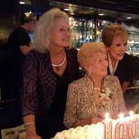 <p>Marge Santangelo LaBrusciano of Rye Neck celebrated her 100th birthday on Sunday. She posed before blowing out candles with daughters Eileen DeFazio of North Carolina and CarolAnn DellaCrosse of White Plains as great-grandson Ben Bouchard looks on.</p>