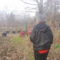 <p>Bobbie Bouton-Goldberg walks the grounds of Mac Bain Farm in Closter. </p>