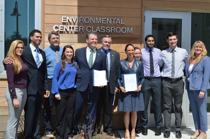 Members of Pace&#x27;s Environmental Policy Clinic pose in celebration of their authored bill&#x27;s passing.