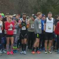 <p>Runners line up at the starting line at Brookfield High School for Friday&#x27;s race.</p>