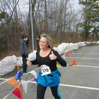 <p>Brookfield resident Pam Mannion completes her very first race on Friday.</p>