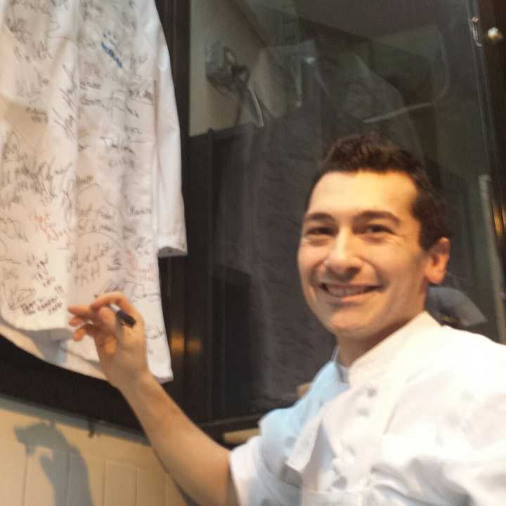 Joseph Cuccia of Lodi signs the James Beard Foundation chef&#x27;s jacket after being named a &quot;rising star.&quot;