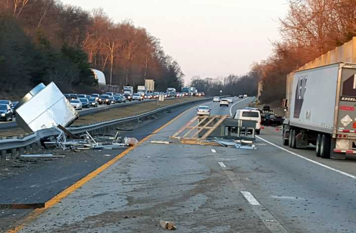 Vehicles were getting by on the right shoulder.