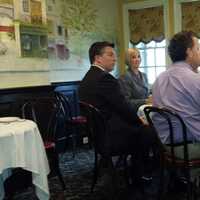 <p>Rye Police Commissioner Michael C. Corcoran Jr., far left, joined members of Rye Rotary Club as guest speaker during a meeting Thursday. Rotary President Pamela Dwyer, left, and President-elect Jason L. Mehler are seated on either side of Corcoran.</p>