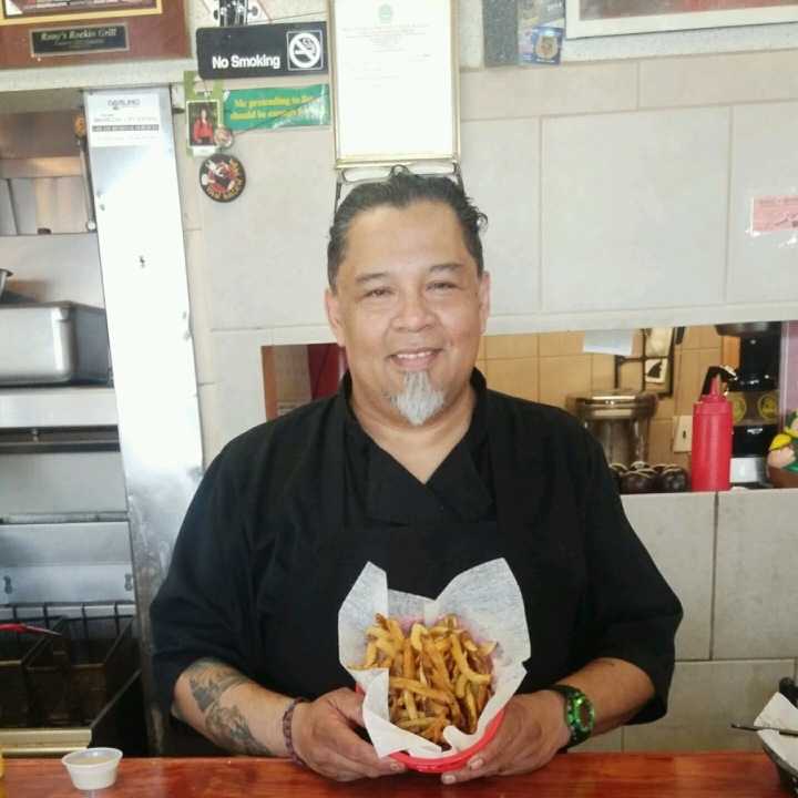 Rony Alvarado, owner of Bergenfield&#x27;s Rony&#x27;s Rockin&#x27; Grill, shows off his fries.