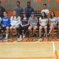 <p>Mamaroneck High School seniors who have committed to college sports teams were recognized Thursday during a ceremony in which they wore their college team shirts and colors.</p>