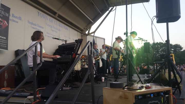 The Mighty Spectrum Band, a local rock group, plays for a large crowd at Clarkstown&#x27;s Fourth of July celebration.