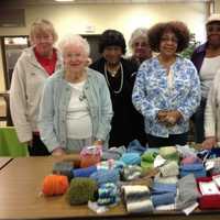 <p>The Happy Hookers donated hats and scarves to The River.</p>