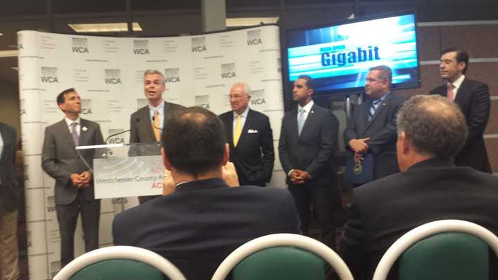 White Plains Mayor Tom Roach, center, at last week&#x27;s Westchester County Association news conference. WCA President William Mooney Jr. and three other city mayors are standing right of Roach