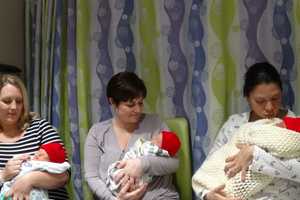 Little Red Hats Take Over Danbury Hospital’s Family Birth Center