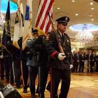 <p>A Bergen County honor guard presents the colors.</p>