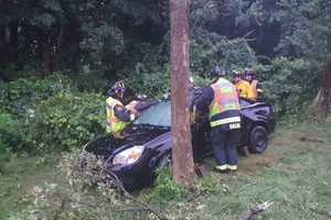 Car Goes Down Embankment On Merritt In Westport During Heavy Rain