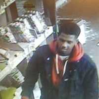 <p>Surveillance footage of a person of interest in the theft of credit cards from a car in Norwalk</p>