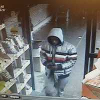 <p>Surveillance footage of a person of interest in the theft of credit cards from a car in Norwalk</p>