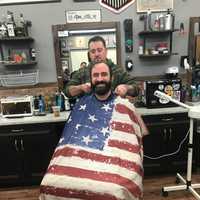 <p>Barber Tom Wright and Ridgewood Sgt. Michael Lembo.</p>