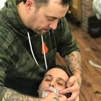 <p>Iconic Barbershop&#x27;s Tom Wright and Ridgewood officer Joseph DiBenedetto.</p>