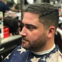 <p>Wycokff Officer Bill Christopher gets ready to have his November beard shaven off at Iconic Barbershop in Glen Rock.</p>