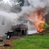 <p>House fire on Carriage Lane.</p>