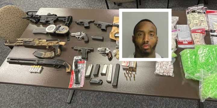 Nine guns and a pound of crystal meth were seized from Philadelphia drug dealer Larry &quot;Gunna&quot; Lamar Hudson, authorities said.