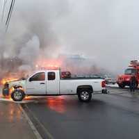 <p>The burning pickup truck.</p>