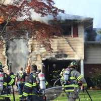 <p>A report that the fire began with a vehicle and then spread to the house couldn&#x27;t immediately be confirmed.</p>