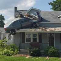 <p>The scene of the car into the second floor of a home in Pennsylvania.</p>