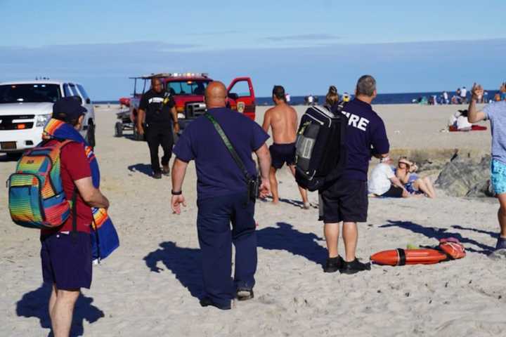 Off-Duty, Rookie Lifeguard Riding Bike Home On NY Boardwalk Saves Swimmer In Distress