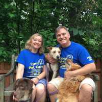 <p>Mike and Angela Lynn of Midland Park with their three dogs.</p>