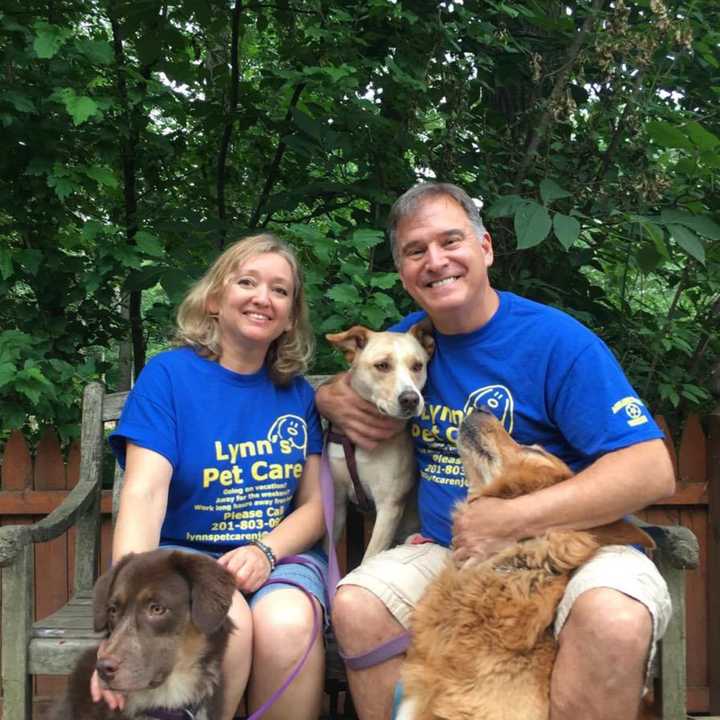 Mike and Angela Lynn of Midland Park with their three dogs.