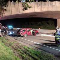 <p>A one-car rollover blocks the northbound Merritt Parkway near Exit 48 in Trumbull late Saturday.</p>