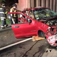 <p>A one-car rollover blocks the northbound Merritt Parkway near Exit 48 in Trumbull late Saturday.</p>