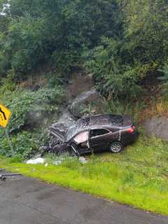 Car Bursts Into Flames After Slamming Into Rock Wall On Route 8 In Shelton