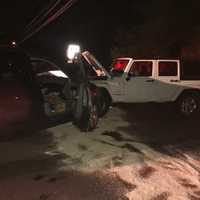 <p>The two-vehicle crash blocked the intersection at Weston Road and Newtown Turnpike in Weston late Saturday.</p>