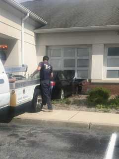 Car Slams Into Commercial Building In Wallkill
