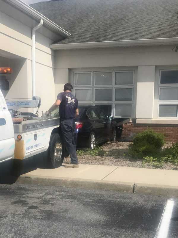 Car Slams Into Commercial Building In Wallkill