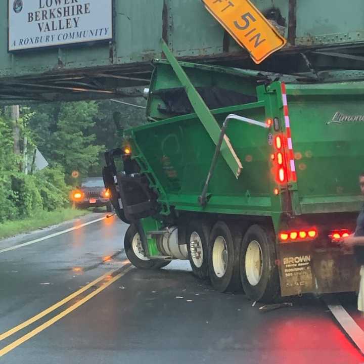 Truck stuck under overpass in Roxbury Township