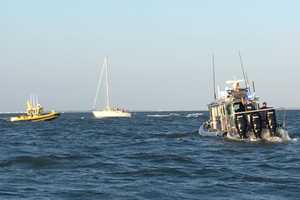 Marine Officers Come To Aid Of Sailboat That Ran Aground Off Southport