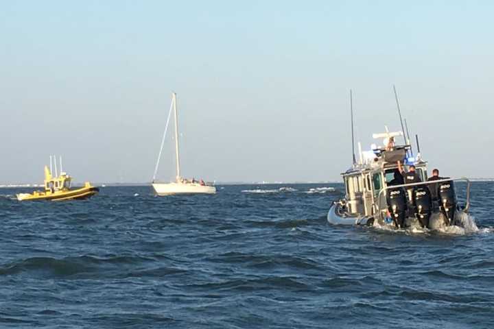 Marine Officers Come To Aid Of Sailboat That Ran Aground Off Southport