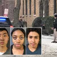 <p>Park (second from left) was captured after he broke a basement window and ran to the roof of a five-story building at Mount Vernon Street and Bergen Avenue, police said.</p>