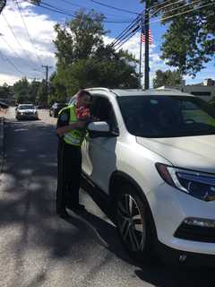 Wilton Police Hand Out Roses In Random Act Of Kindness