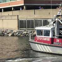 <p>Stamford Fire Department divers search the waters of Stamford Harbor for a missing man.</p>