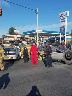 PHOTOS: Two Hospitalized In Newburgh Rollover Accident