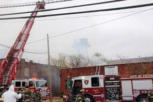 Fire Destroys Familiar Paterson Water Tower, Ravages Abandoned Mill