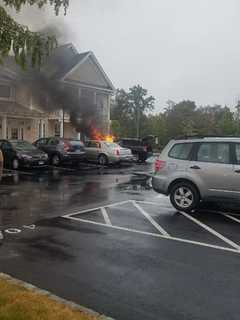 Danbury Firefighters Douse Burning Car At Apartment Complex