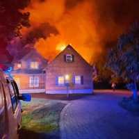 <p>Fire crews were quick to douse a roaring blaze that broke out in the attached garage of a Sussex County home before dawn Wednesday.</p>