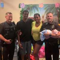 <p>Officers Addezio and Padulese, Dad (Imani), Mom (Dy&#x27;Shanye), and Grandmother.</p>